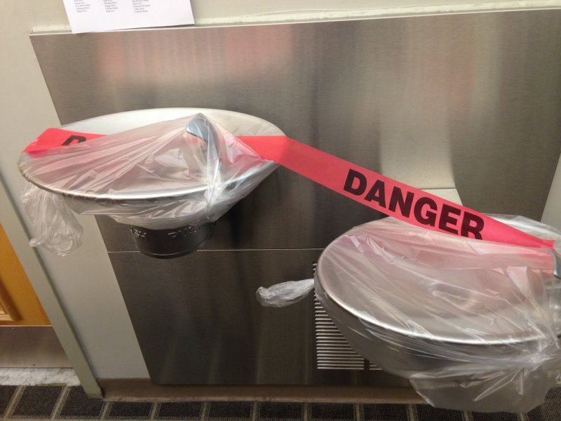 From Friday through Sunday, water fountains at the Ossining Public Library were covered in plastic wrap and red tape.
