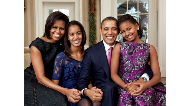 Obama and the First Family pose for a portrait.