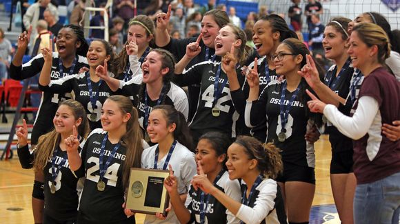 Photo of the Ossining Varisty Girls Volleyball Team after winning the final of the Section 1 Class AA Championship. Photo taken from www.lohud.com